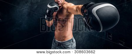 Man With Beautifully Muscular Body Is Ready For Fight, Swowing His Spectacular Hits.