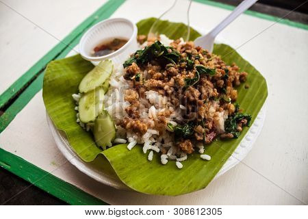 Thai Rice Meal On Banana Leaf At Ampahwa Floating Market In Samut Songkhram, Thailand