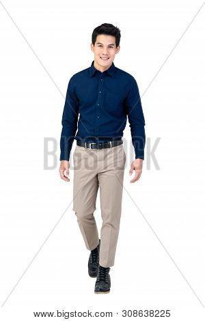 Studio Portrait Of Sophisticated Handsome Smiling Young Asian Man Walking In Semi-formal Clothing