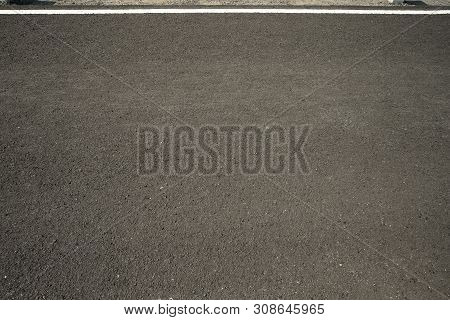 Asphalt Road With Marking Lines White Stripes Texture Background.