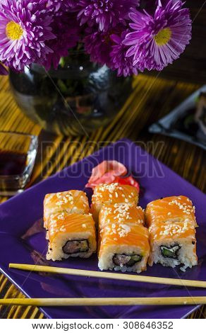 Ushi With Red Fish On A Purple Plate