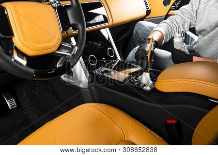 Brush Cleaning Off Dust From The Car Interior Details, Close Up View