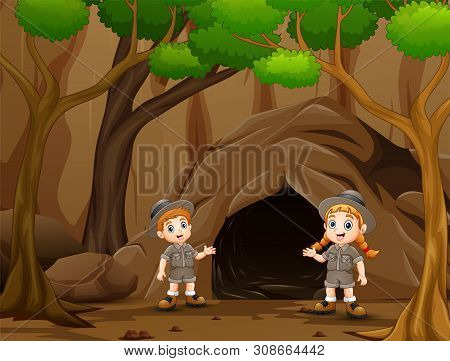 Scout Boy And Girl Talking Near The Cave