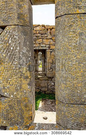 Interior View Of The Ruins Of The Medieval Church Of Killilagh Through A Stone Window In The Village