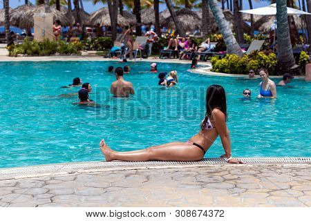 Dominican Republic, Bayaibe, Catalonia Gran Dominicus Hotel - 06 June 2019: Beautiful Tanned Slim Wo