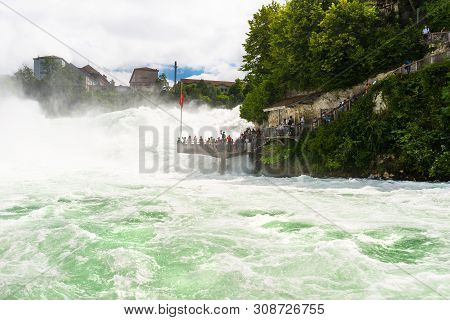 Neuhausen Am Rheinfall, Switzerland - 23 July 2019. Waterfall On The River Rhine In The City Neuhaus