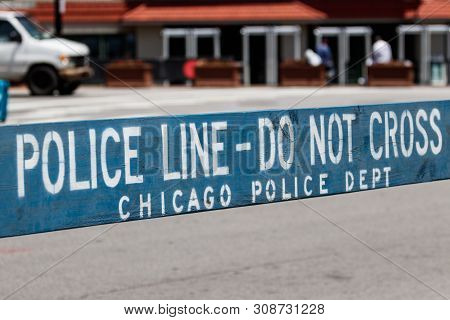 Chicago - Circa June 2019: Police Line Do Not Cross Sign Courtesy Of The Chicago Police Department I