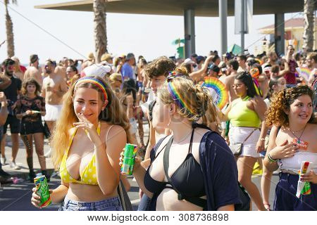 The Annual Parade Lgbt. Girls Lesbians Walking In The Gay Pride Parade. Parade Of Tolerance. Rainbow