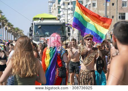 The Annual Parade Lgbt. Gay And Lesbians Walking In The Gay Pride Parade. Parade Of Tolerance. Rainb