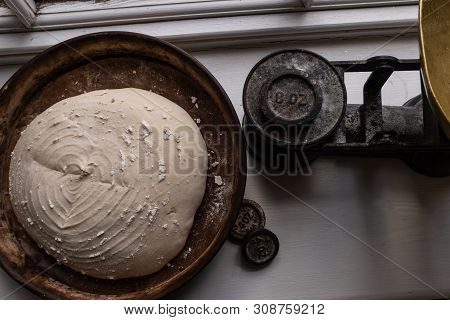 Sourdough Bread Dough Ready For The Oven, With Weights And Weighing Scales