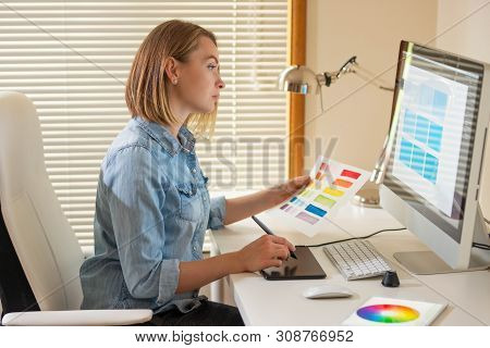 Graphic Designer Sitting At Work. Illustrator. Web Designer. Freelancer