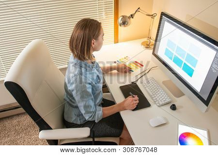 Graphic Designer Sitting At Work. Illustrator. Web Designer. Freelancer