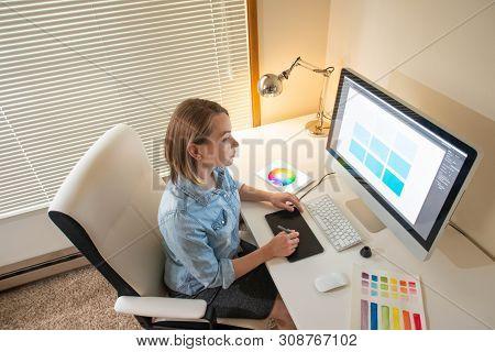 Graphic Designer Sitting At Work. Illustrator. Web Designer. Freelancer