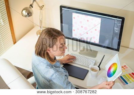 Graphic Designer Sitting At Work. Illustrator. Web Designer. Freelancer