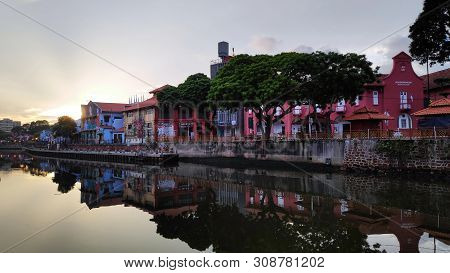 Melaka, Malaysia - 25 Jun, 2019: View Of River House And Riverwalk With Sunrise In Malacca Malaysia.