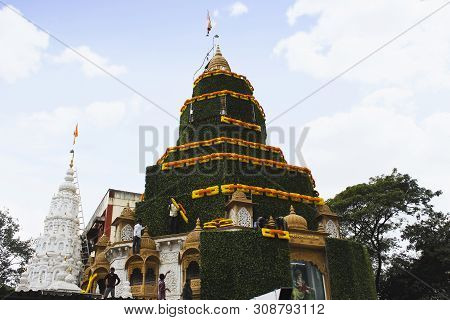 People Decorating Dagdusheth Halwai Ganpati Mandir At Pune, Maharashtra, India.