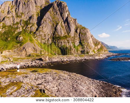 Seascape With Lighthouse, Rest Stop Location On Andoya Island. Scenic Rocky Coastline Near Nordmela 