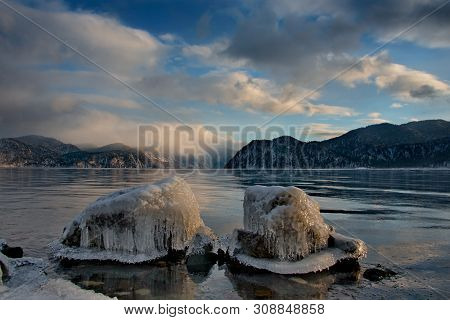 Russia. Mountain Altai. Despite The Strong Siberian Frosts, Teletskoye Lake Freezes Completely Once 