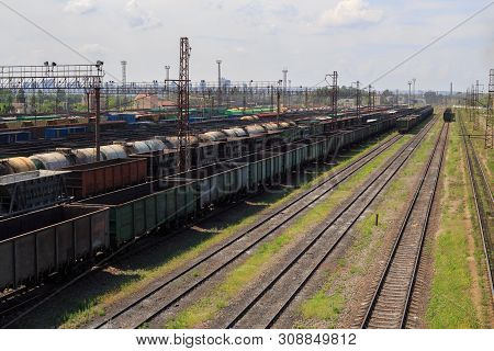 Freight Trains On City Cargo Terminal. Railways In Train Parking. Arain Arrived At The Station. Carg