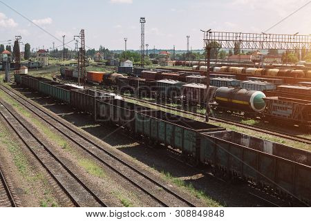 Freight Trains On City Cargo Terminal. Railways In Train Parking. Arain Arrived At The Station. Carg