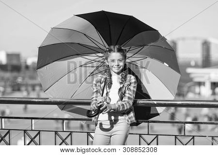 Positive And Bright. Girl Cute Child Standing With Colorful Umbrella. Child Under Umbrella. Colorful