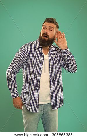 Eavesdropping And Spying. Hearing Test. Man Bearded Hipster Hold Hand Near Ear To Hear Better. Guy T