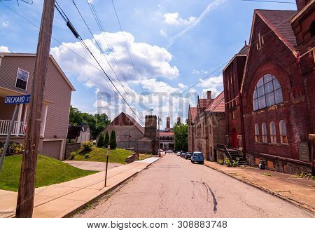 Braddock, Pennsylvania, Usa 6/29/2019 A View Of Parker Avenue Looking Towards Library Street On A Br