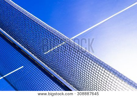 Blue Table Tennis Or Ping Pong. Close-up Ping-pong Net. Close Up Ping Pong Net And Line.