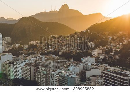 Sunset View In Copacabana, Apartment Buildings, Favela Babilonia, Mountains, And Corcovado