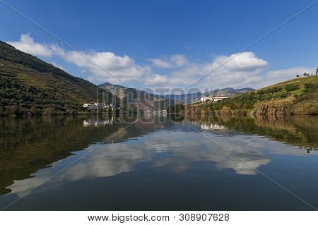Scenic View Of The Pinhao Village With Terraced Vineyards And The Douro River And The Douro Valley, 