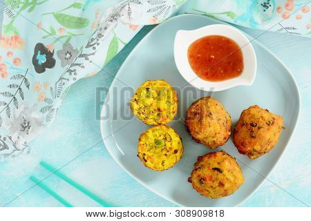 Fresh Deep Fried Vegetable Pakora With Sweet Chili Dipping Sauce.  Traditional Indian Snack With A H
