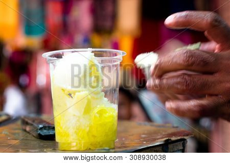 Refreshing Kulfi Faluda Home Made Ice Cream Served In A Clear Glass At A Street Food Stall