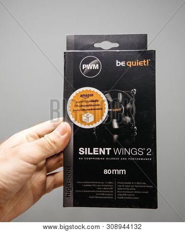Paris, France - Jun 4, 2019: Man Hand Holding Package Of Be Quiet Pwm Silent Wings 2 80 Mm Computer 