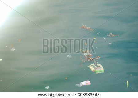Trash, Plastic, Garbage, Bottle... Environmental Pollution On The Beach. Royalty High-quality Free S