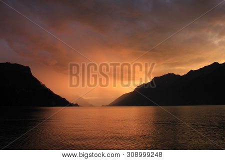 Dramatic Sky Over Lake Brienz. Thunderstorm Arriving At Sunset.