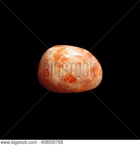 Sun Stone (heliolite) Isolated On Black Background