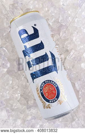 IRVINE, CALIFORNIA - MARCH 21, 2018: A 24 ounce king can of Miller Lite on ice. Introduced in 1975 Miller Lite was the first mainstream light beer.