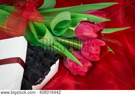 Sexy Background With Pink Tulips And Lingerie