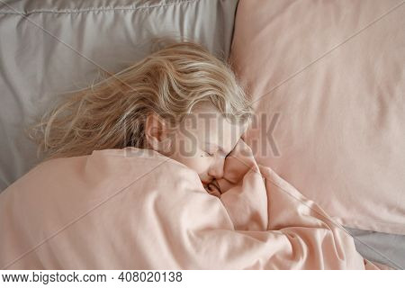 Sad Crying Child Girl Lying Under Blanket In Bed. Sad Kid In Stress Frustration. Child Lying In Tear