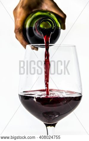 Pouring A Glass Of Red Wine High Quality