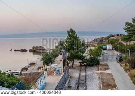 Split, Croatia - Aug 15, 2020: End Of Train Rail Near Coastline In Split New Town In Summer