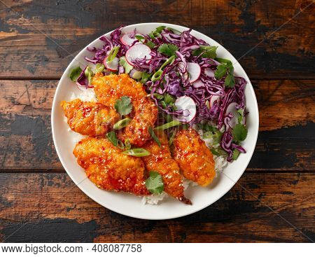 Korean Fried Chicken With Red Cabbage Salad And White Rice. Asian Food