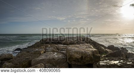 Sunset At Costa Da Caparica, A Famous Place For Water Sports In The Coast Of Portugal