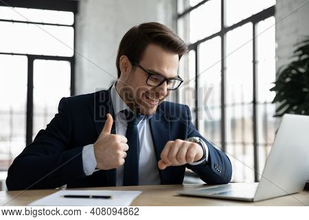 Happy Businessman Look At Watch Feel Excited Meeting Deadline