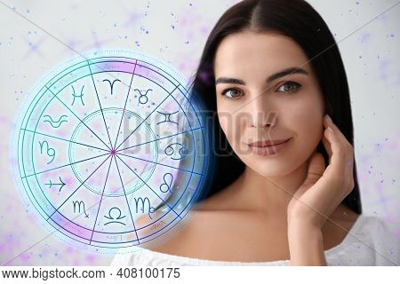 Beautiful Young Woman And Illustration Of Zodiac Wheel With Astrological Signs On Light Background