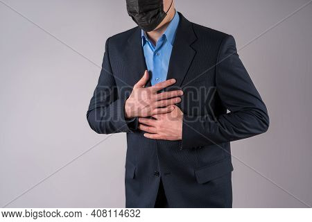 Office Worker With Coronavirus Symptoms On Gray Background