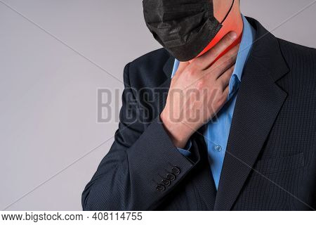 Office Worker With Coronavirus Symptoms On Gray Background