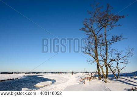 Debki, Poland - February 13, 2020: Snow Covered Beach On The Baltic Sea. Debki, Poland