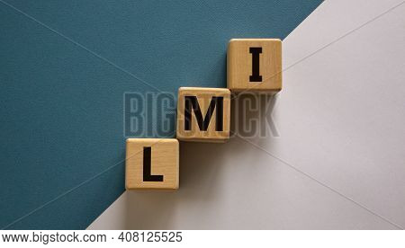 Lmi, Lenders Mortgage Insurance Symbol. Wooden Cubes Form The Word Lmi, Lenders Mortgage Insurance. 