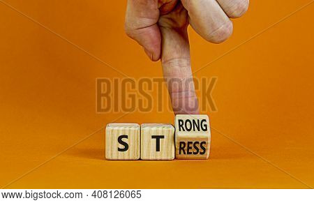 Strong Stress Symbol. Businessman Turns Wooden Cubes With Words 'strong Stress'. Beautiful Orange Ba